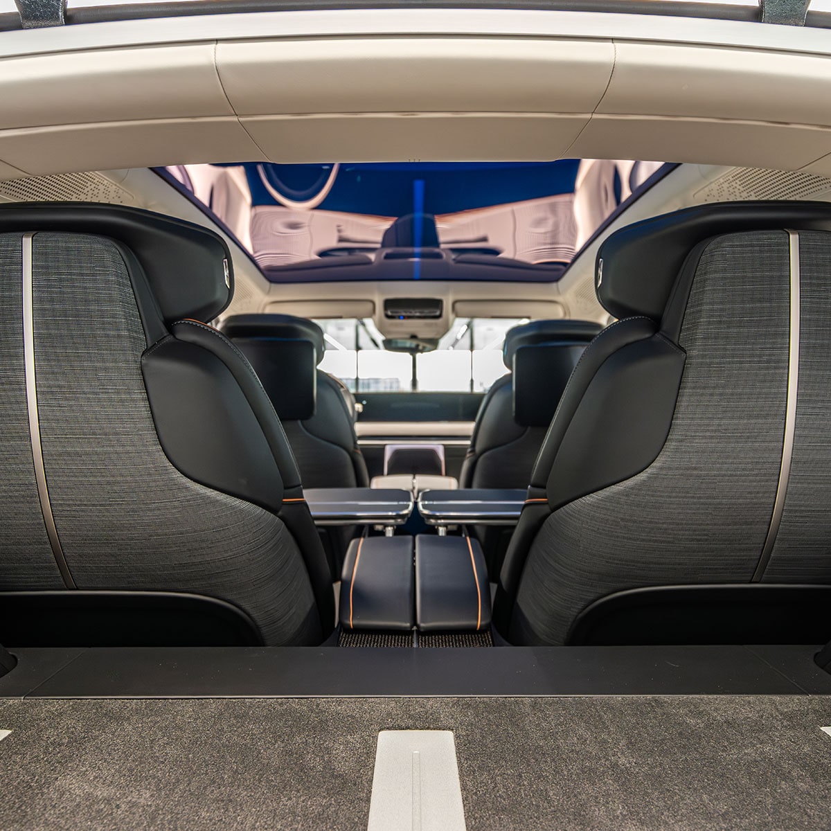 A Close-up View of the Red Leather and Carbon Fiber Details in the Interior of the Cadillac CELESTIQ.