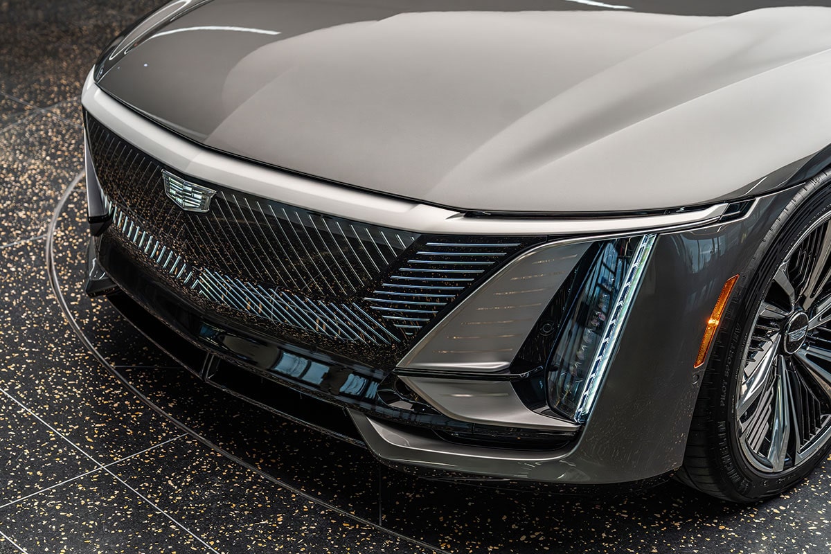 The Rear View of a Cadillac CELESTIQ Interior with Red Leather Seats and Multiple Entertainment Screens.