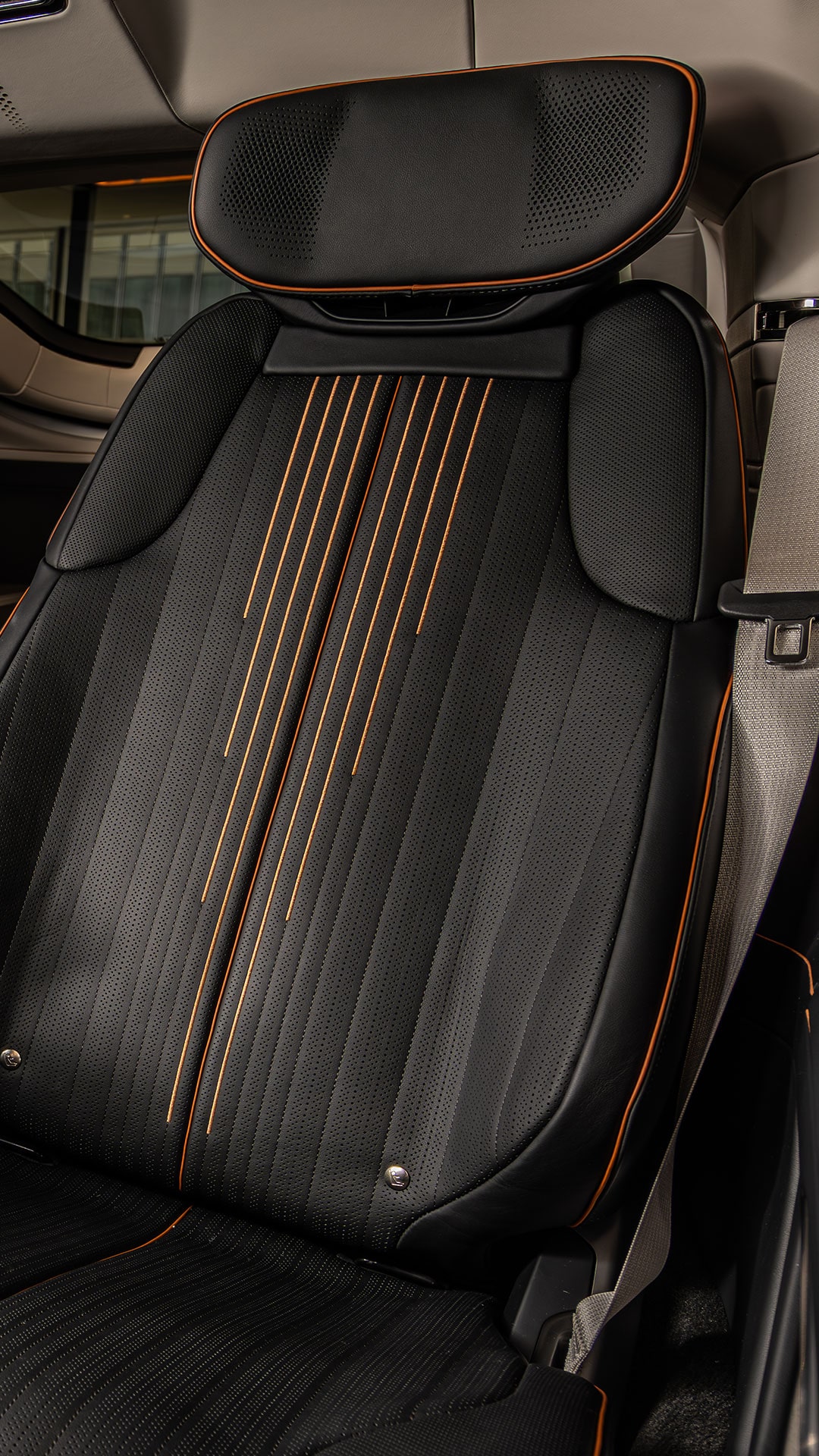 A Close-up View of the Red Leather and Carbon Fiber Details in the Interior of the Cadillac CELESTIQ.