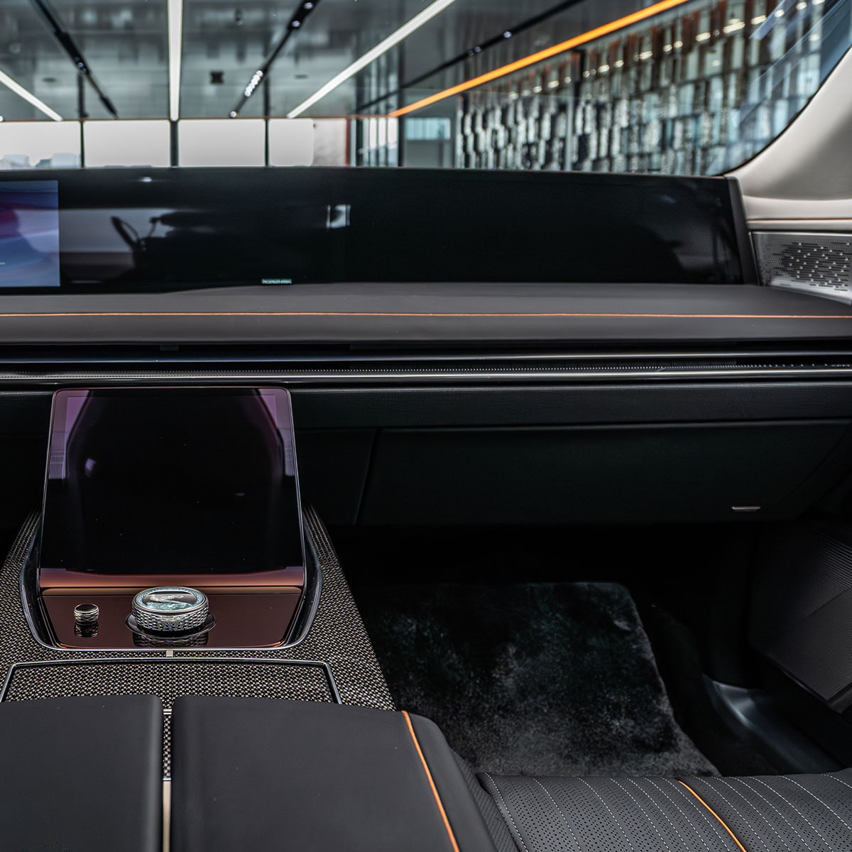The Luxurious Red Leather Interior of a Cadillac CELESTIQ, Showing the Front Seats and Center Console.