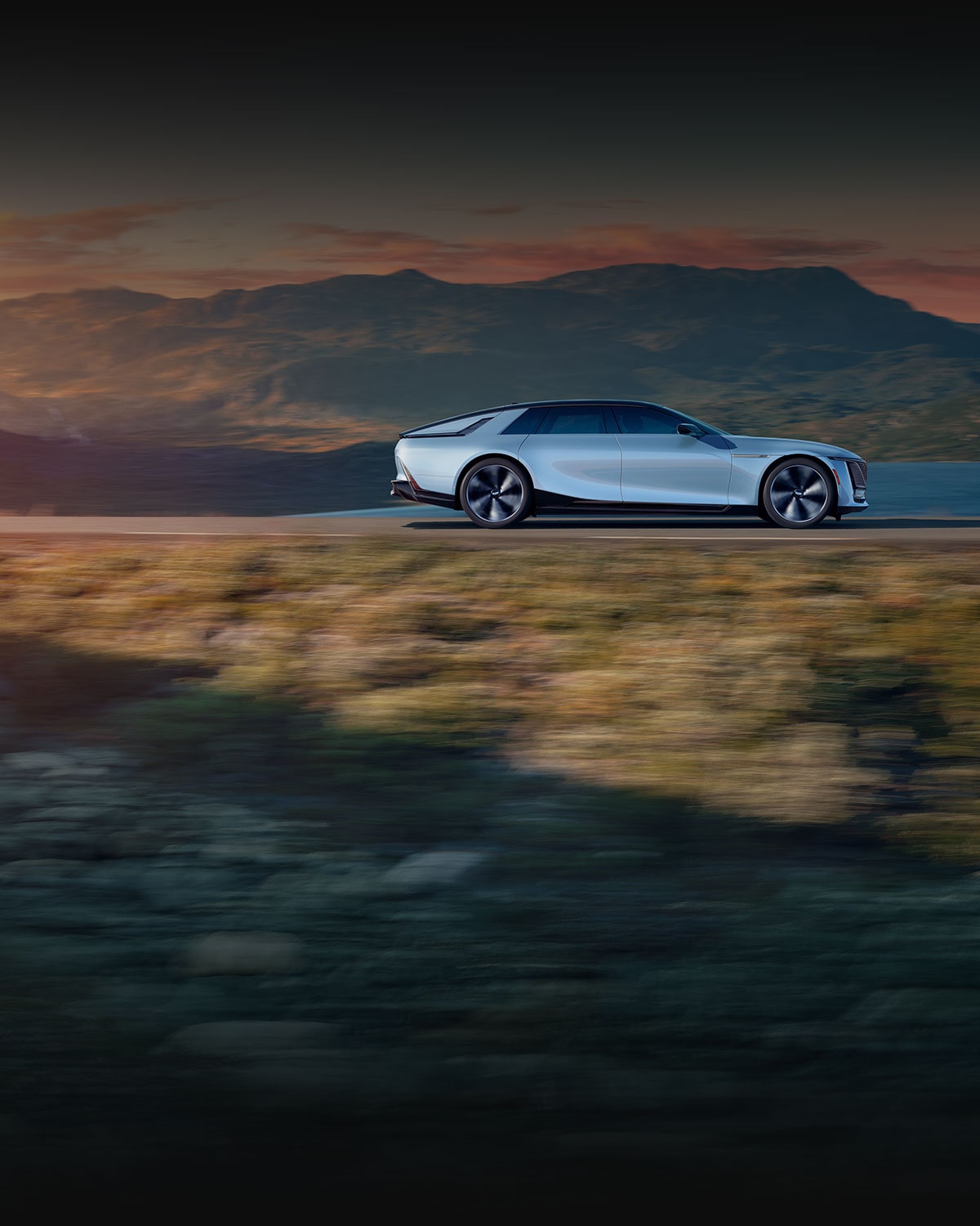 Side Profile View of the Cadillac CELESTIQ Cruising Through the Mountains