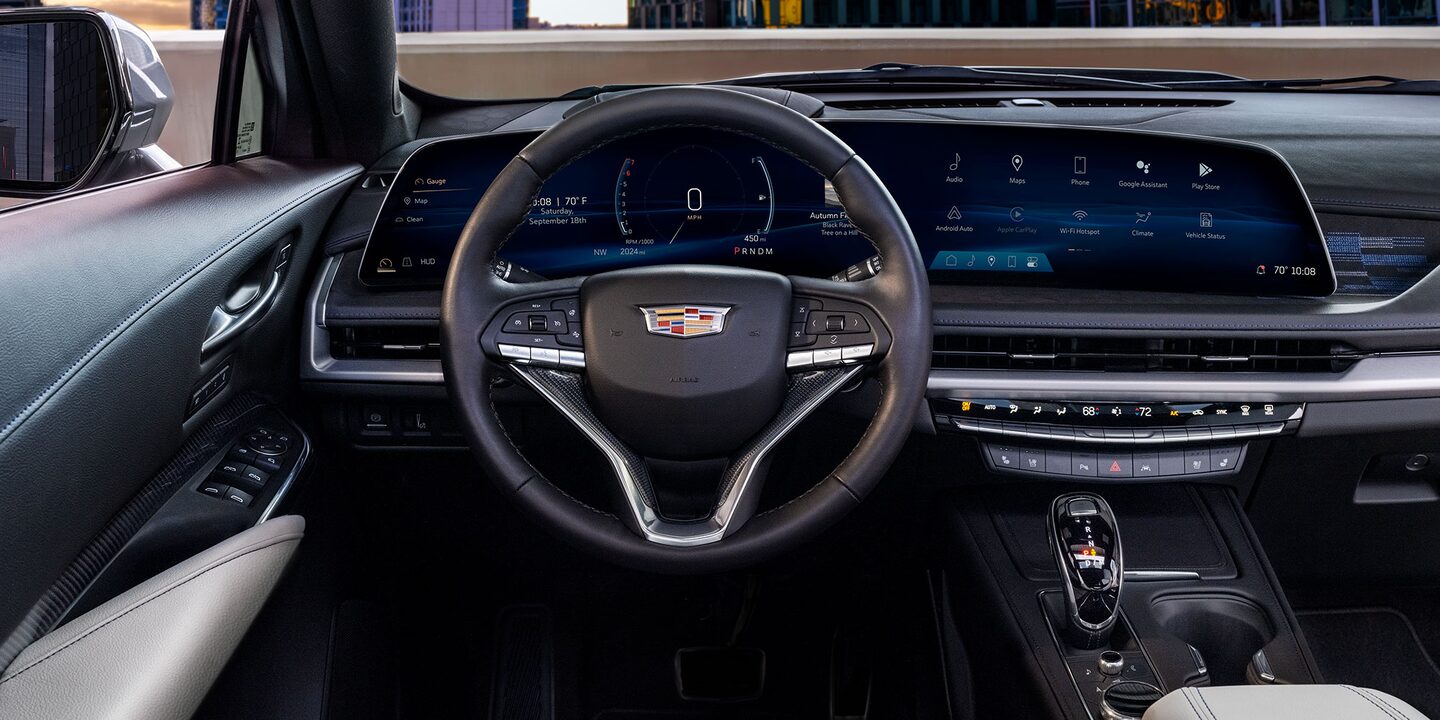 2025 Cadillac XT-4 driver seat view of the black leather interior and 33 inch diagonal display