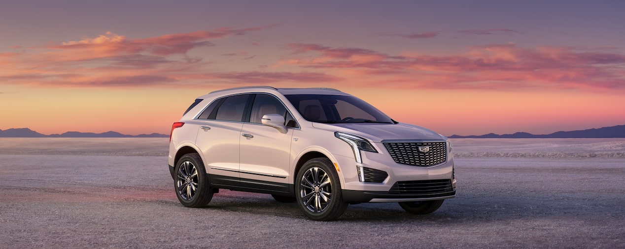 The 2025 Cadillac XT5 Parked with a Beautiful Sunset in the Background