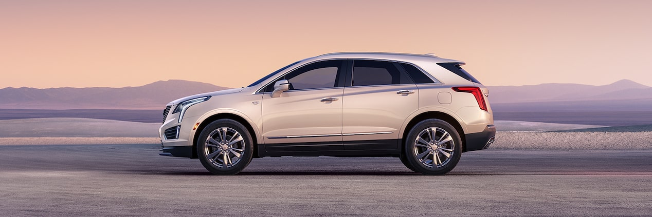 The Crystal White Tricoat Cadillac XT5 Parked During a Lovely Sunset