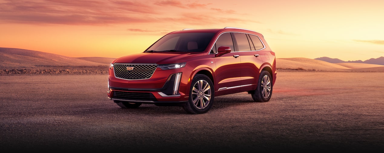 The Impressive Cadillac XT6 Parked in an Open Desert During Sunset