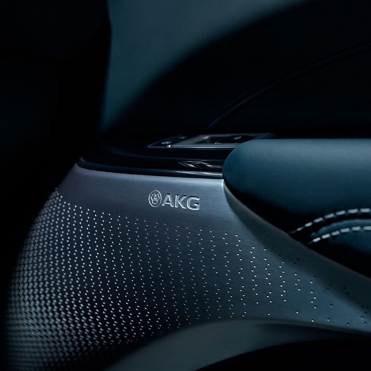 Close-up of an AKG Speaker and Seat Controls on the 2025 Cadillac LYRIQ Door