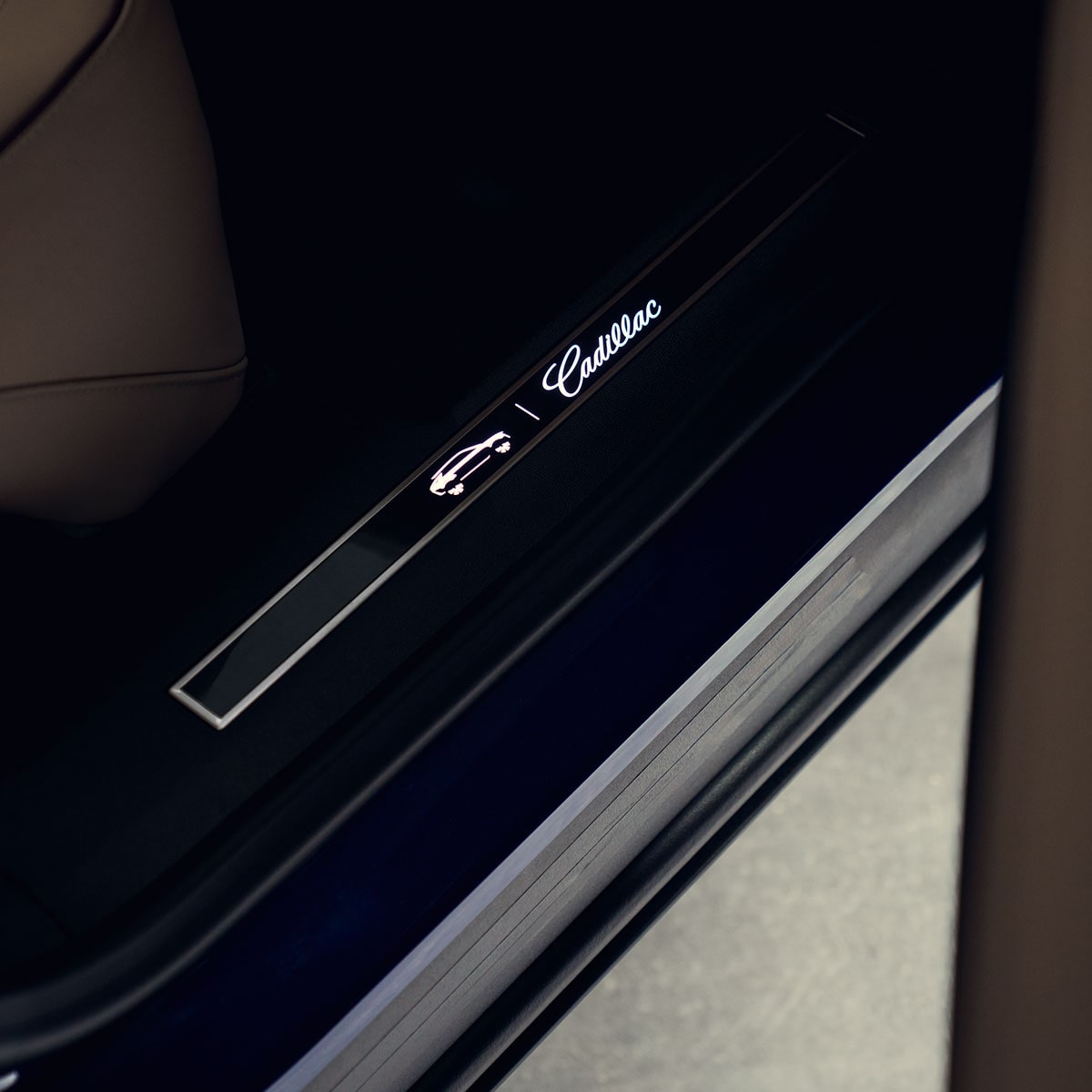 Close-up of the Interior Sill Plate Detail in a 2025 Cadillac LYRIQ
