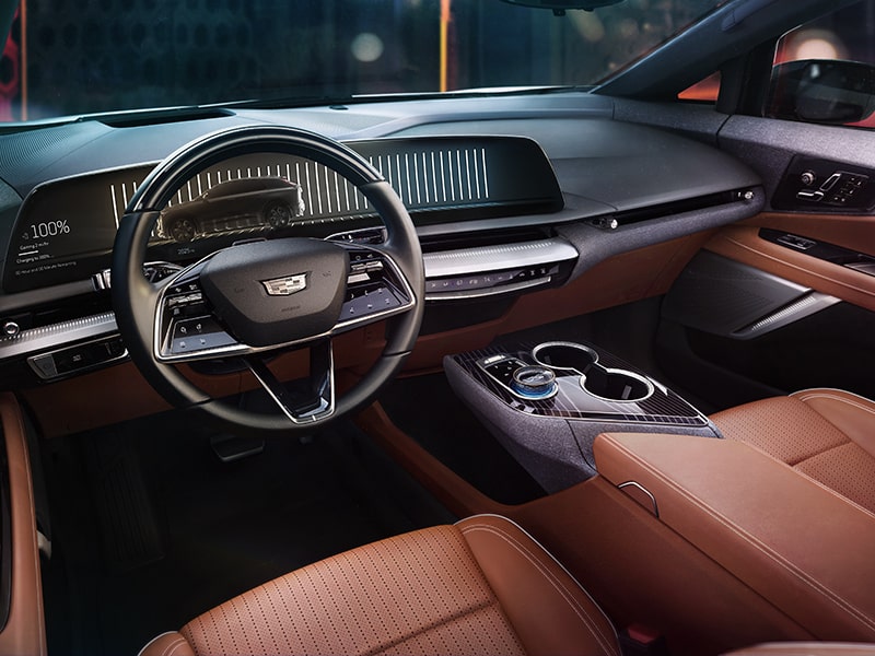 Vista en primer plano de los colores vibrantes del Cadillac OPTIQ 2025 cerca de los controles de climatización