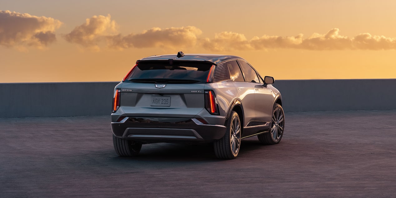 Rear View Shot of the 2025 Cadillac OPTIQ Parked During a Beautiful Sunset