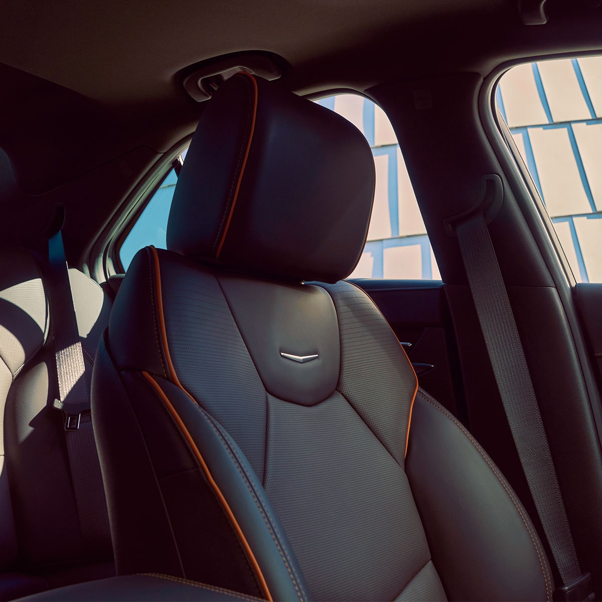 A 2025 CT4-V Black Leather Driver's Seat with Orange Stitching Details