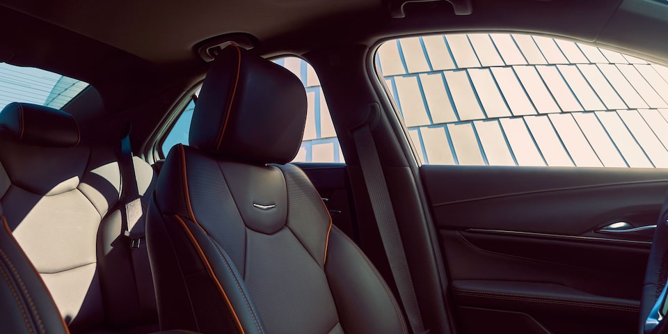 A CT4-V Black Leather Driver's Seat with Orange Stitching Details