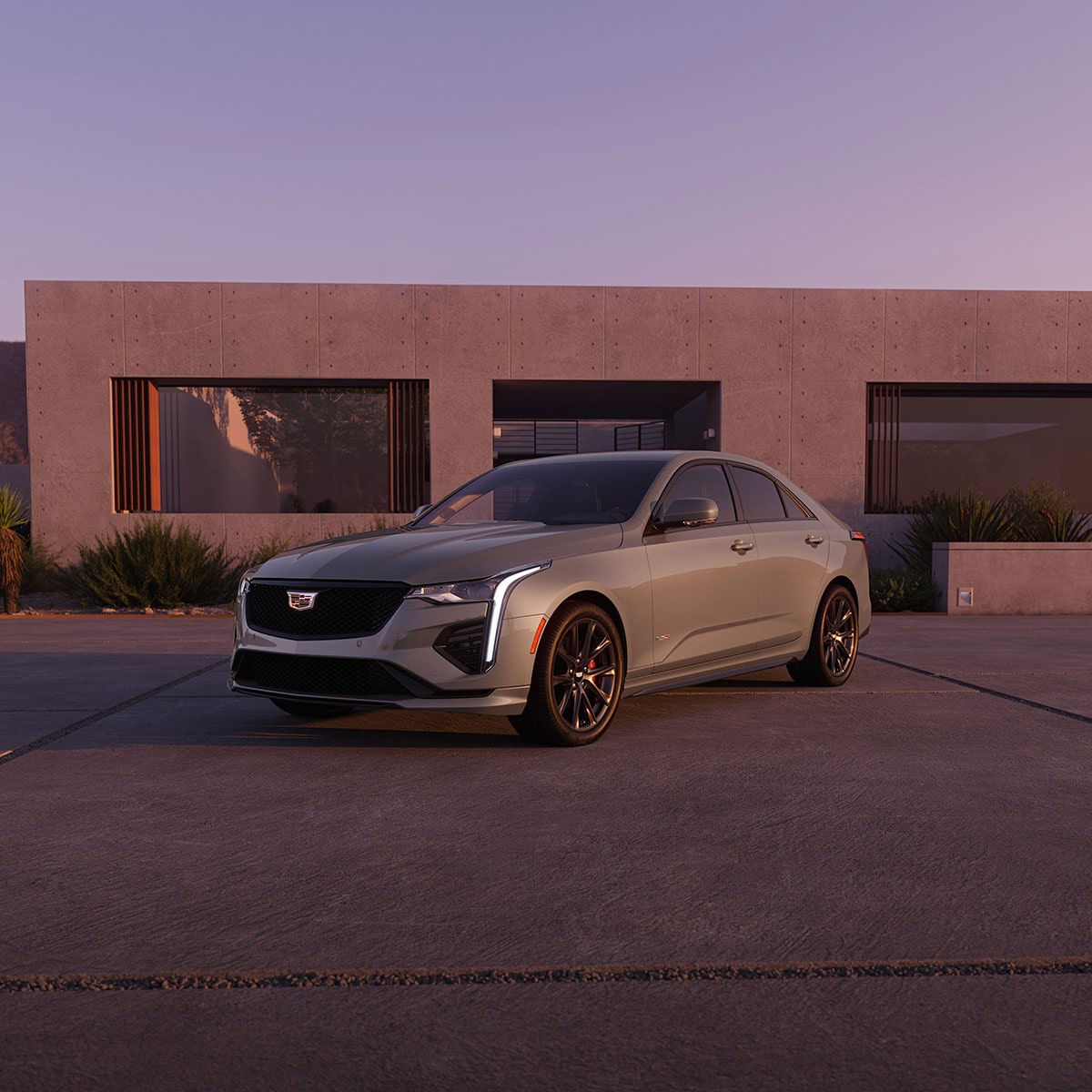 A Cadillac CT4-V With a Sunset in the Background