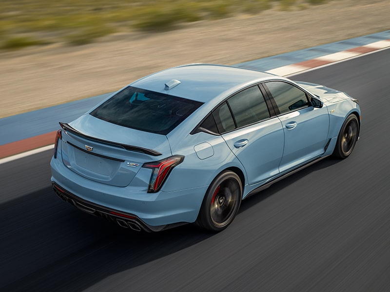 Overhead View of a 2025 Cadillac CT5-V Driving Down the Road Next to a Desert