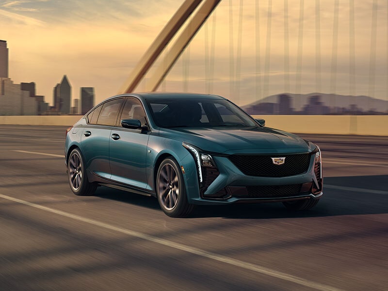 Front View of the Sleek 2025 Cadillac CT5 Sport Parked in Warehouse
