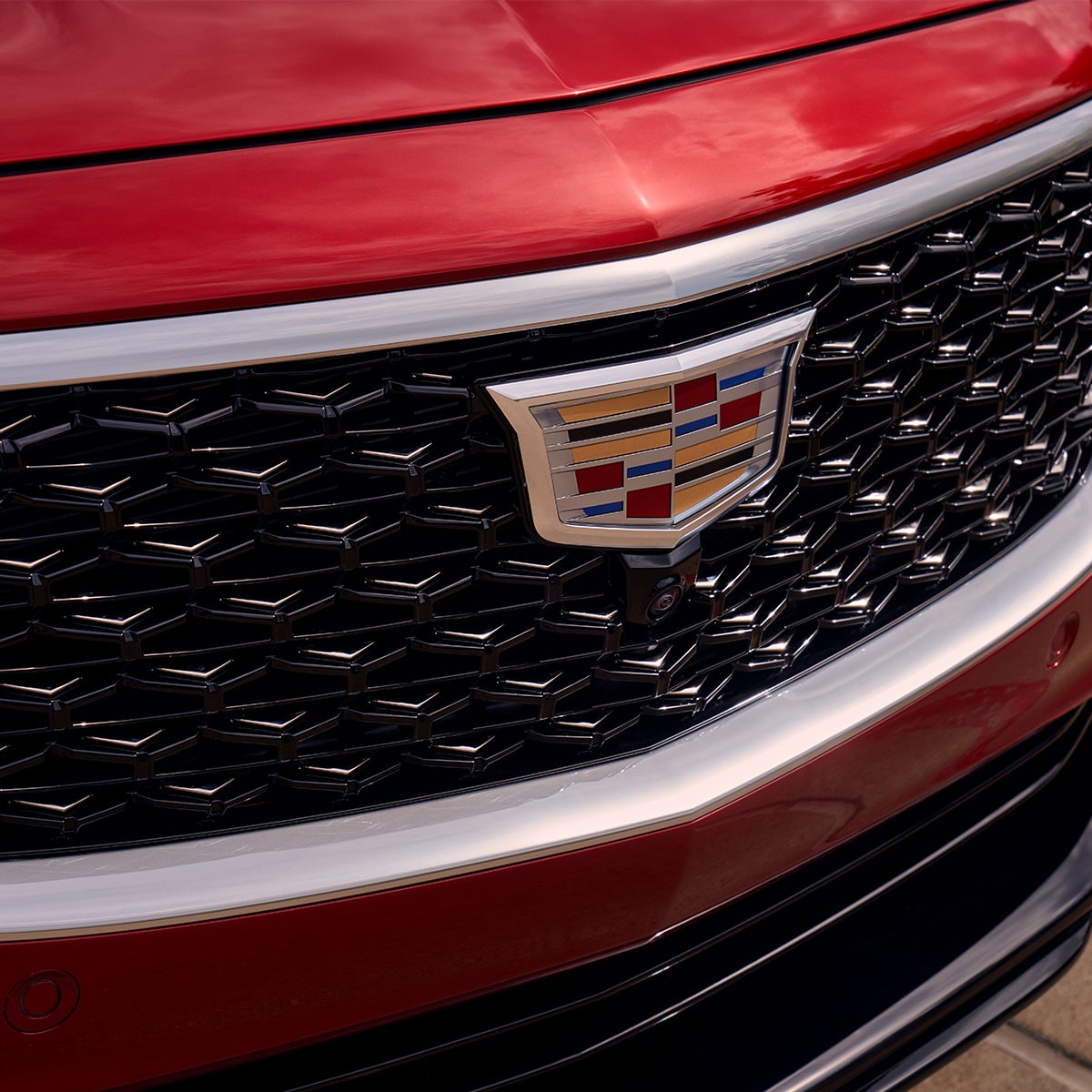 Close-Up View of 2025 Cadillac CT5 Crest on the Larger Front Grille