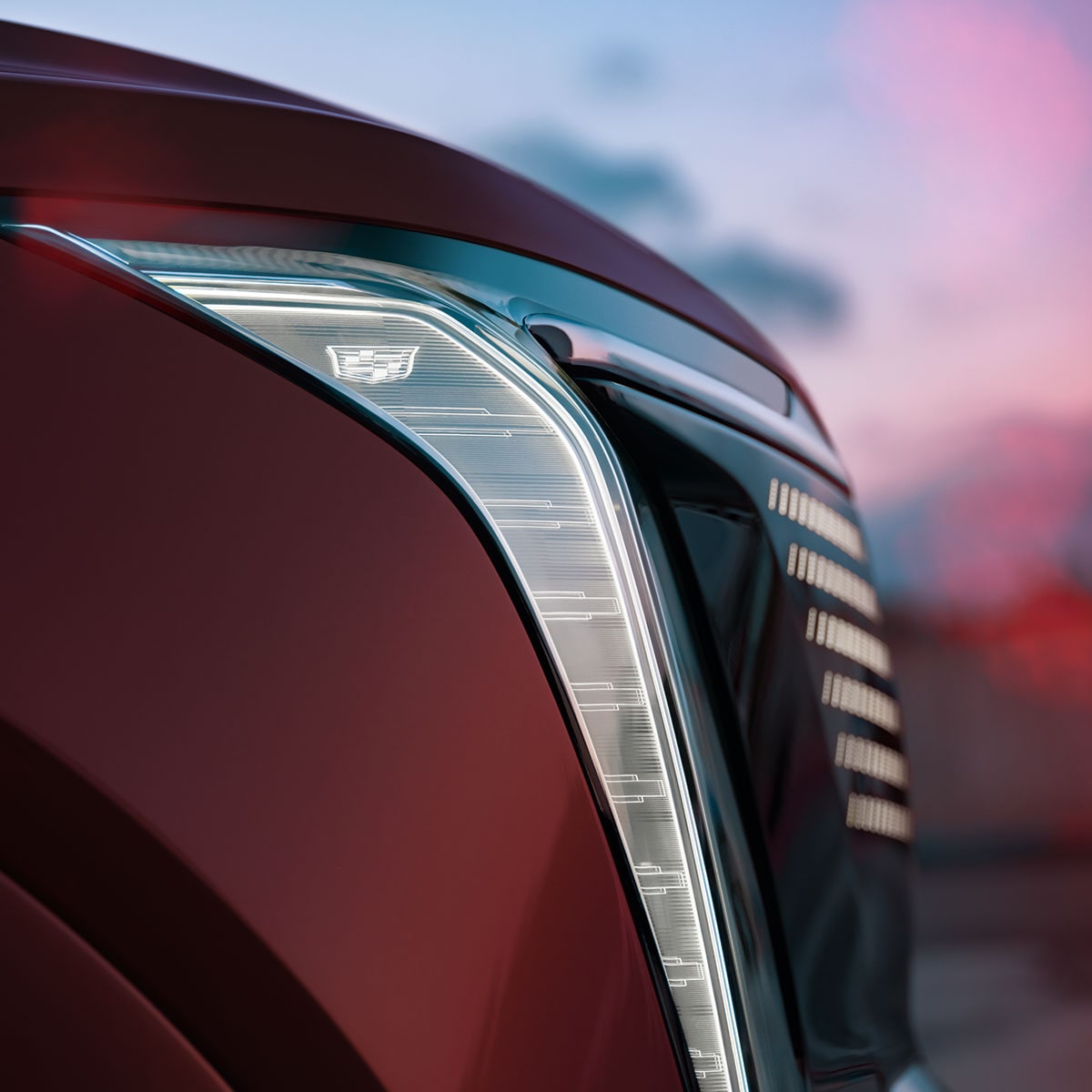 2025 Cadillac Escalade IQ Parked Outside a Restaurant at Night