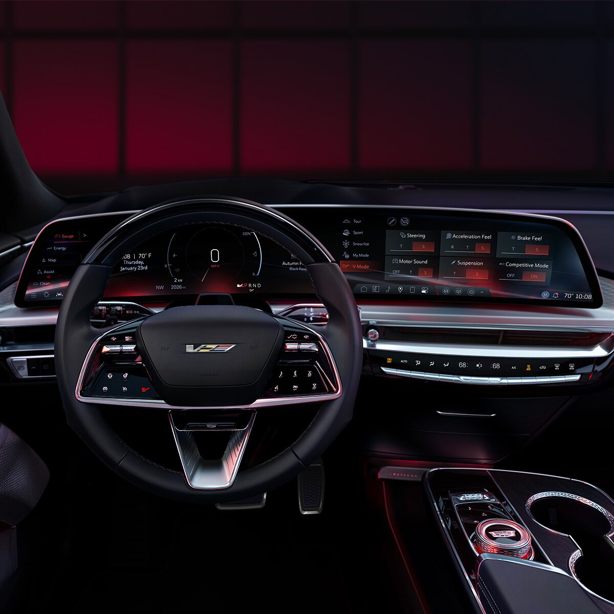 Driver's Seat View of the 2026 LYRIQ-V Leather Steering Wheel and 33-inch LED Display with Red Lighting