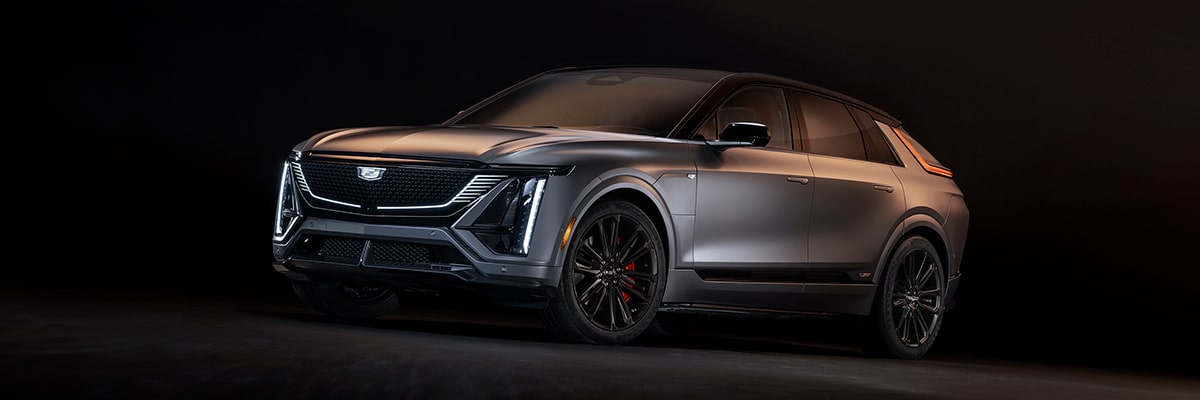 Low Side Profile View of the 2026 LYRIQ-V in a Black Showroom