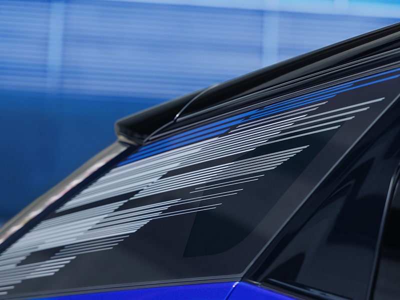 Close-up of the Modern Pattern on the 2026 OPTIQ-V Rear Quarter Glass