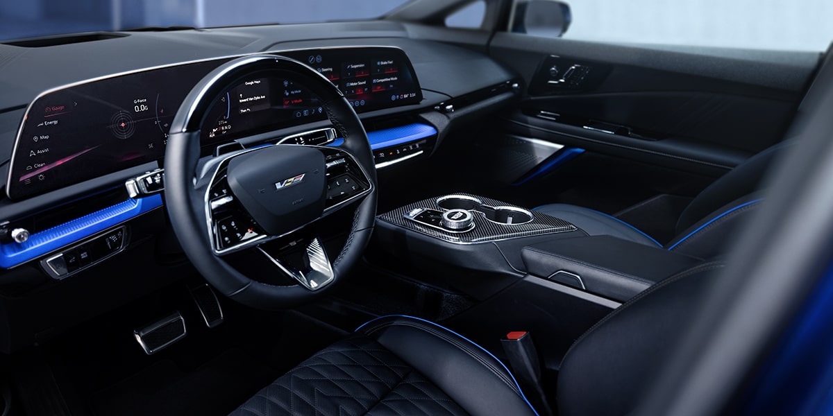 Driver Seat View of the 2026 OPTIQ-V Front Row Interior and Sleek Dashboard