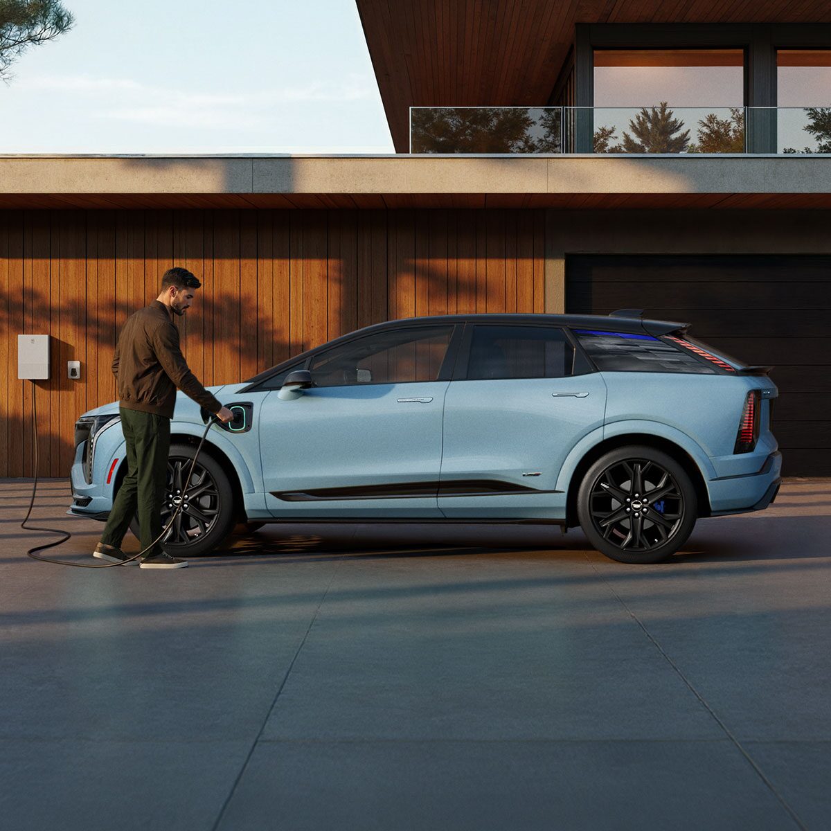 Close-up of the EV Charger in a Blue 2026 OPTIQ-V Charging Port