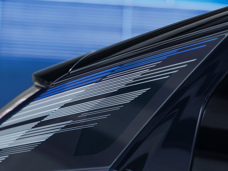 Close-up of the Modern Pattern on the 2026 OPTIQ-V Rear Quarter Glass