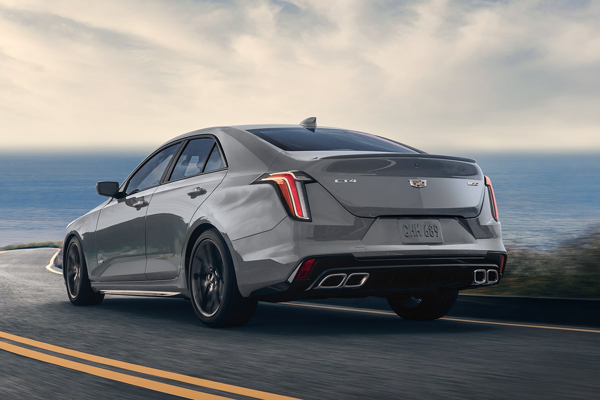 Rear View of the    Cadillac CT4-V Driving by the Beach