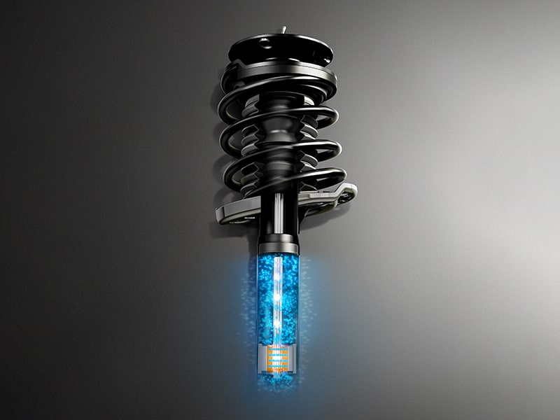 The Cadillac CT4-V Suspension Part on Gray Background