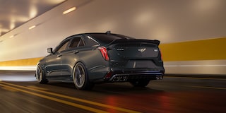 Three-quarters View of a Yellow Cadillac CT4-V Parked in Parking Garage