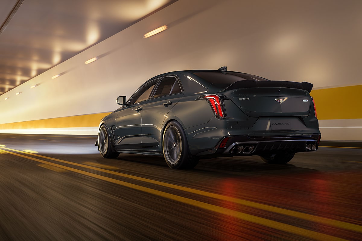 Three-quarters View of a Yellow Cadillac CT4-V Parked in Parking Garage
