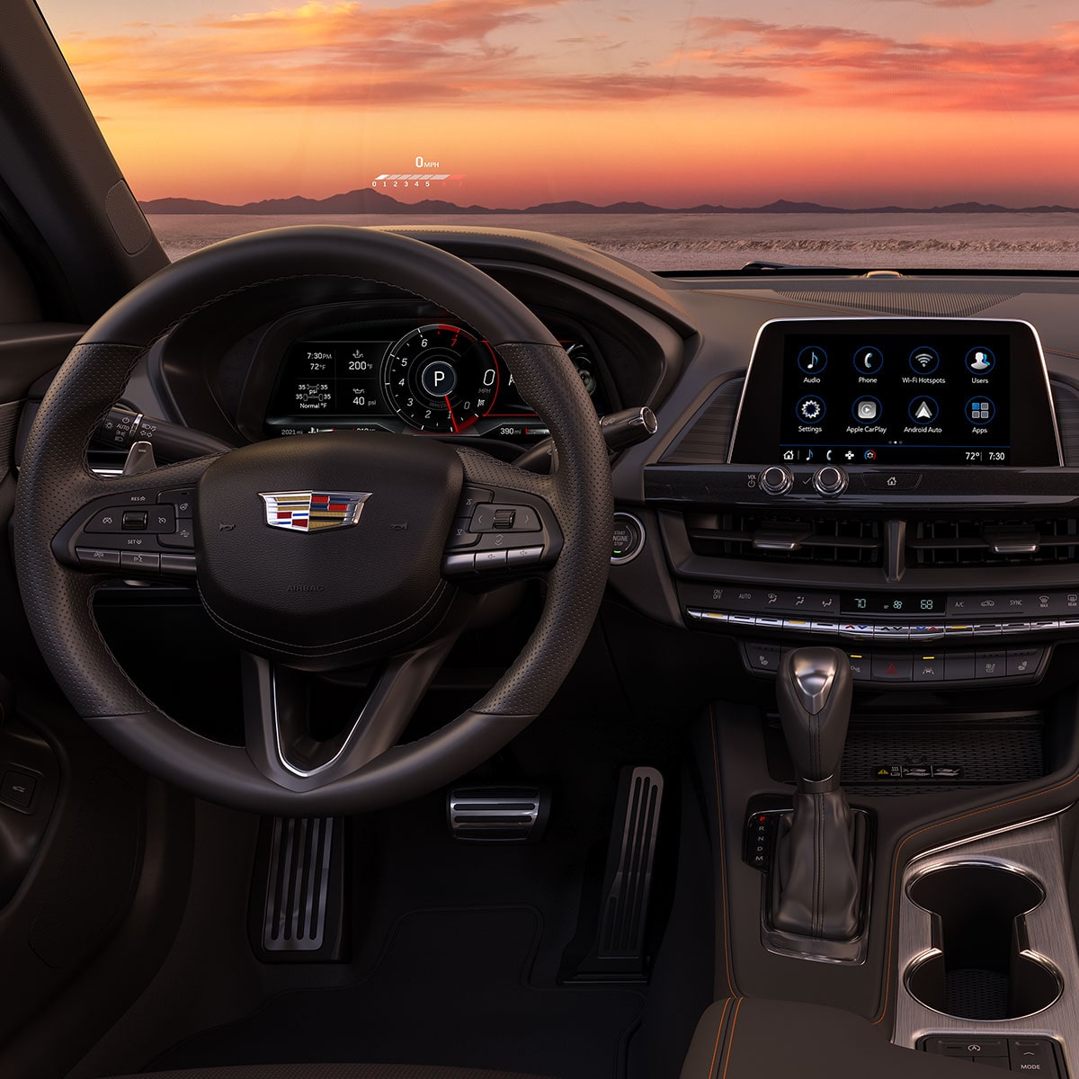Driver's View of the 2025 CT4 Sleek Infotainment System and Steering Wheel