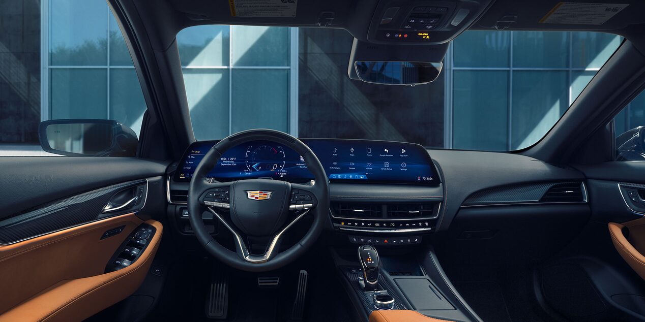Driver's View of 2026 Cadillac CT5 Tan Leather Front Seats and LED Infotainment System