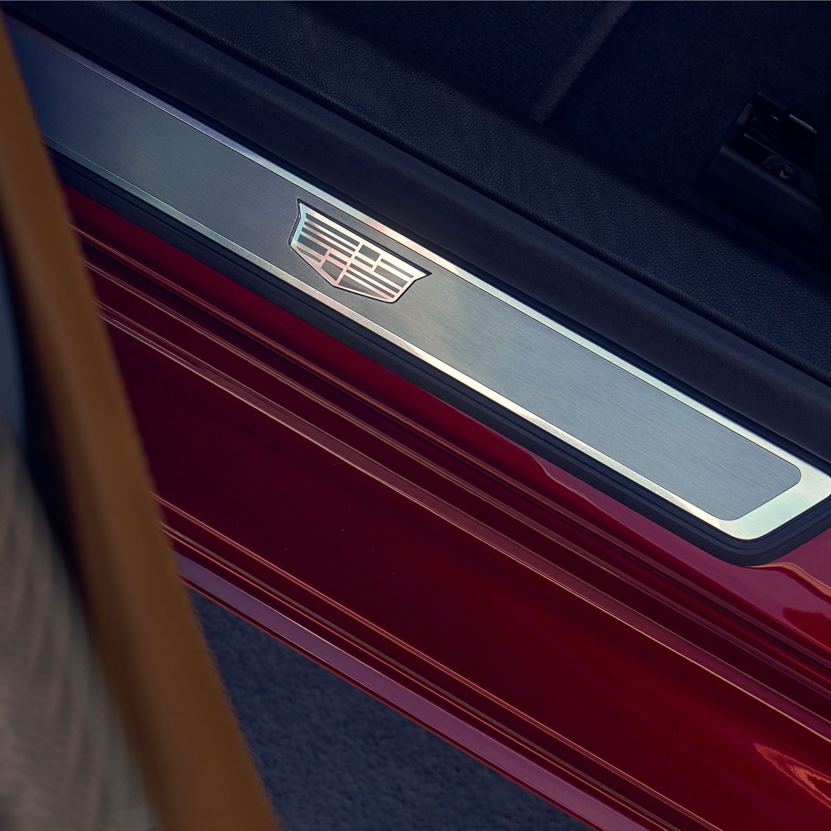Close-Up View of the Crest Detail on the 2026 Cadillac CT5 Door Rocker Panel