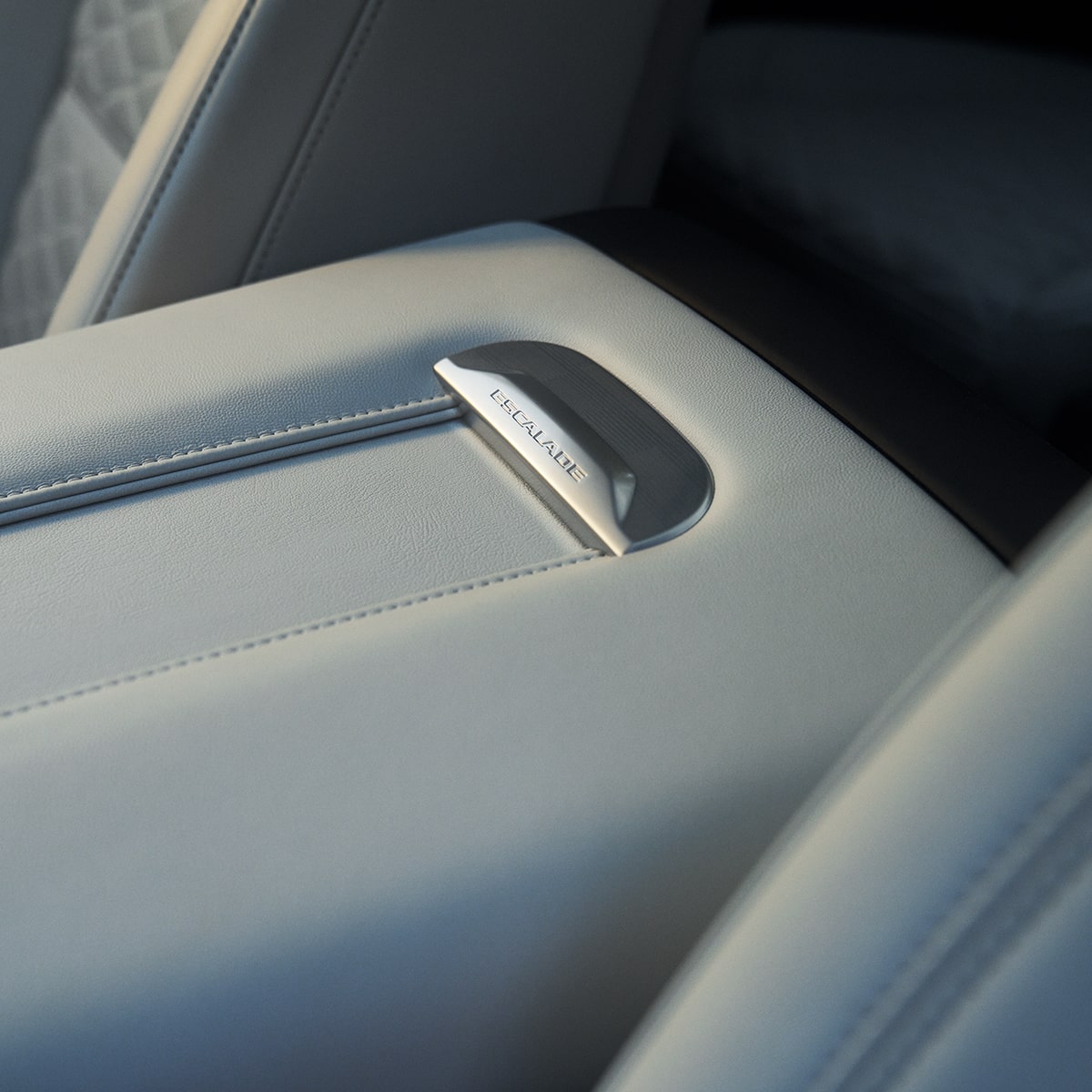 Close-Up of the Escalade Nameplate on the 2026 Escalade's Middle Console