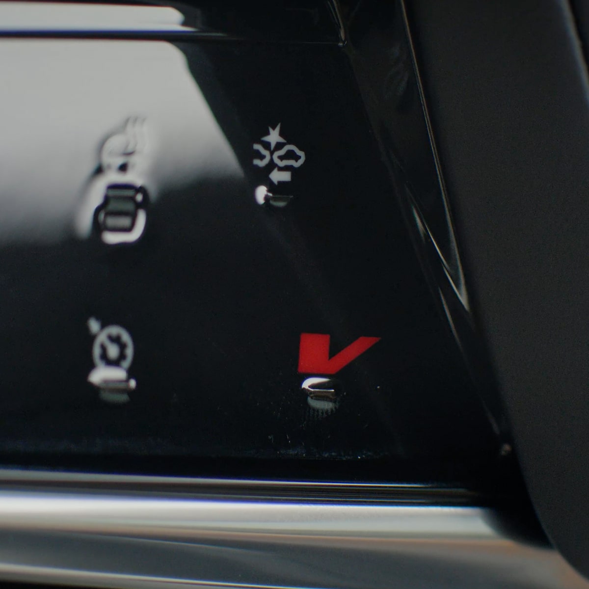 Close-Up of the V-Mode Button on the 2026 Escalade Steering Wheel