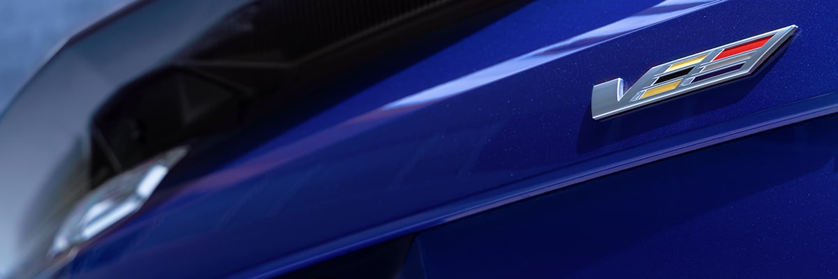 The V-Series Logo on the 2027 OPTIQ-V Exterior