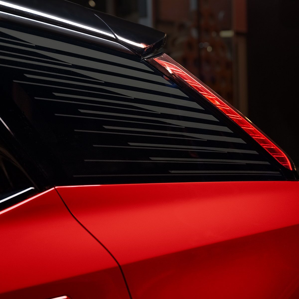 Close-up View of the 2027 OPTIQ's Rear Window Accents
