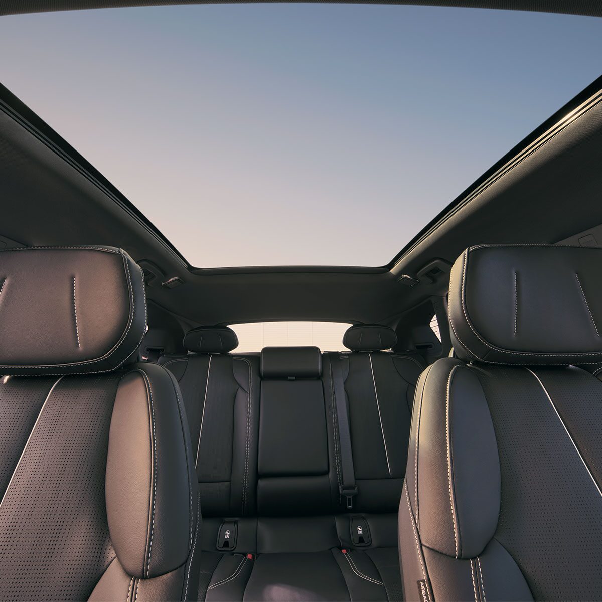 Dashboard View of the Cadillac OPTIQ's Two Rows of Seats and the Skyglass Roof