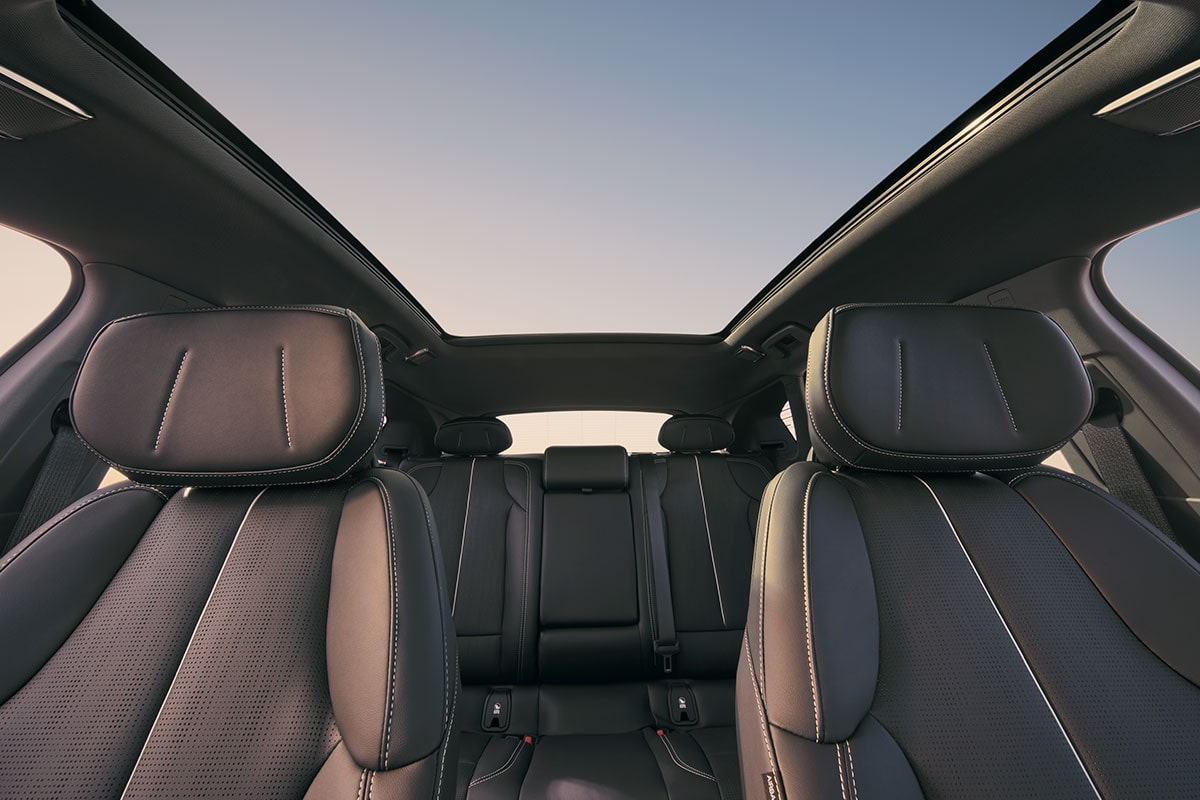 Dashboard View of the Cadillac OPTIQ's Two Rows of Seats and the Skyglass Roof