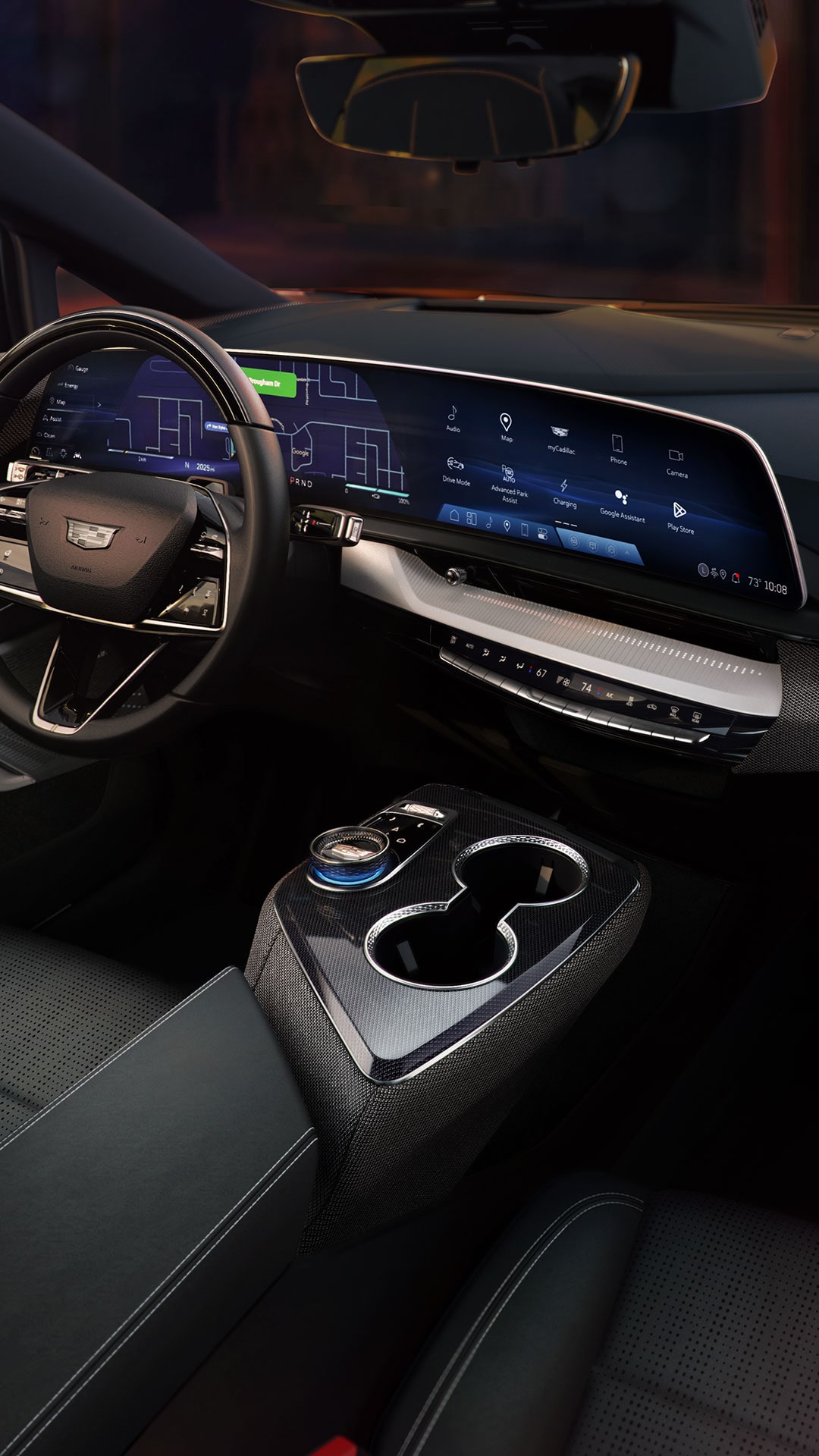 Passenger Seat View of the Steering Wheel and Display Screen of the 2027 Cadillac OPTIQ