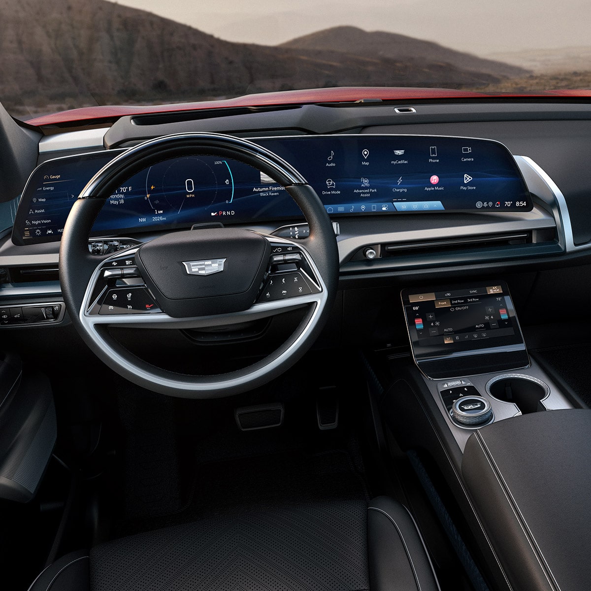 Close-up of the 2027 VISTIQ Driver's Seat and Dashboard Outlooking the Mountains