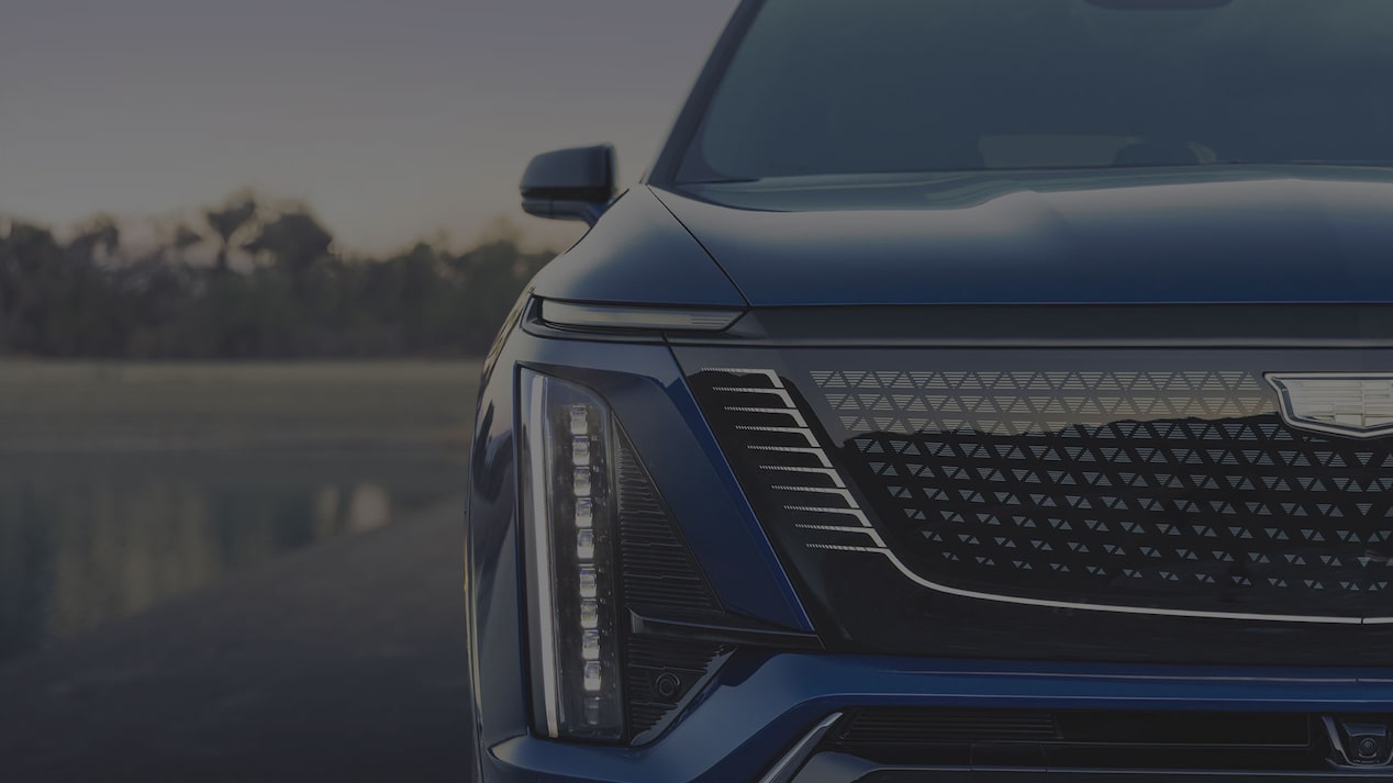 Close-up of the 2027 VISTIQ 3-row SUV Grille and Passenger Side Headlamp