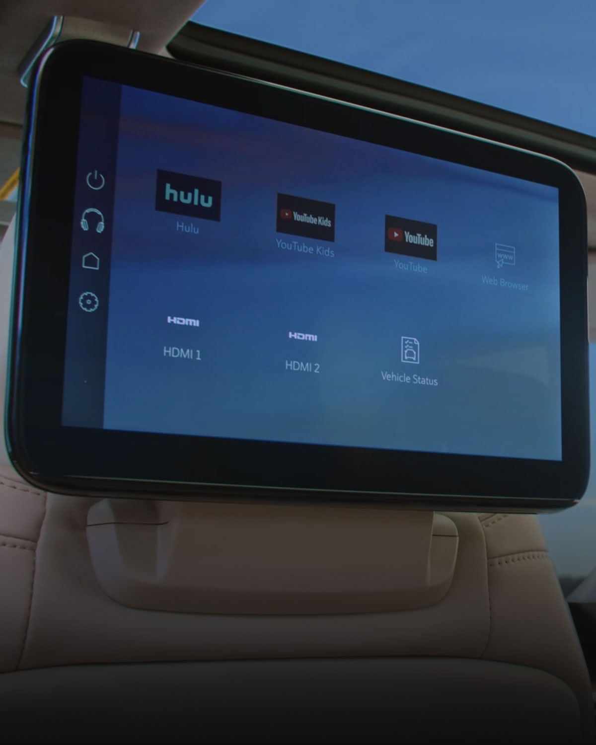 Close-up of the Rear-Seat Infotainment Screens Mounted Behind the Front Headrests in a 2027 Cadillac Escalade