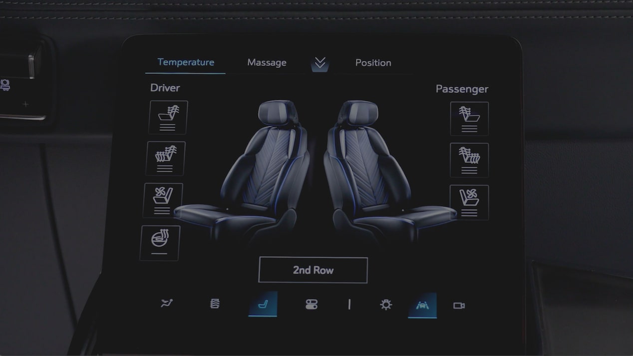 A 2027 Escalade Center Console Touchscreen Displaying Heated, Ventilated, and Massage Seat Controls for Front Occupants