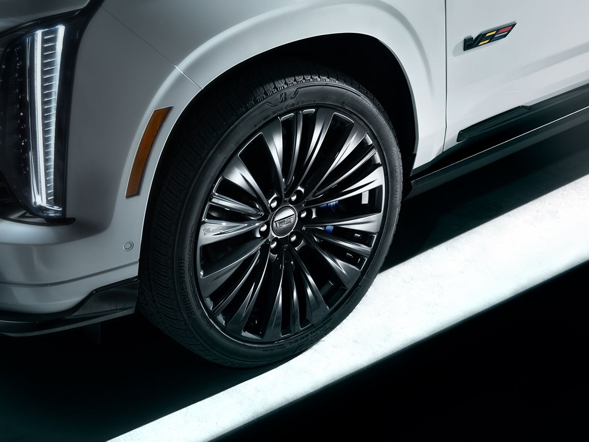 Close-up of a White Cadillac Escalade-V Collector Series Driver Side Wheel