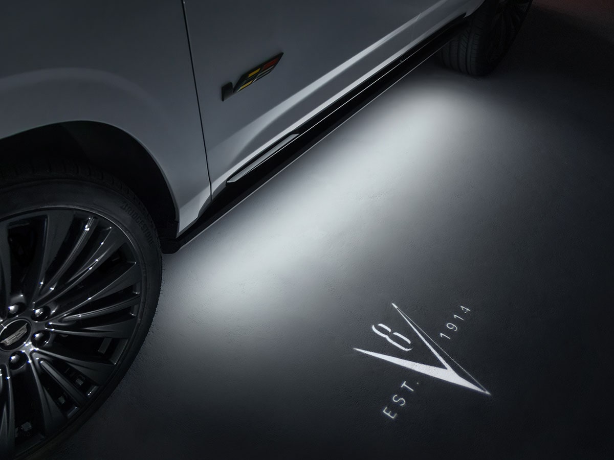Cadillac Escalade-V Collector Series Illuminated Door Projection Displaying a V-Series Graphic and EST. 1914