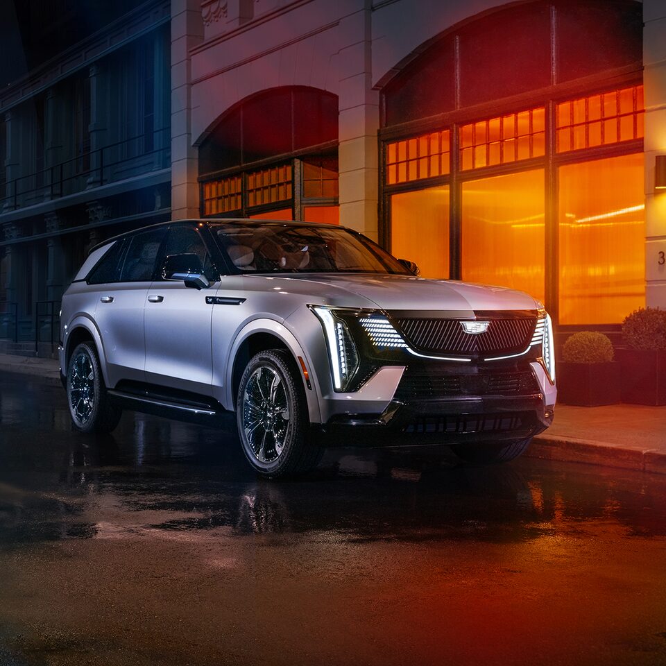 Frontal Side View of the 2025 Cadillac ESCALADE IQ Parked In Front of a restaurant