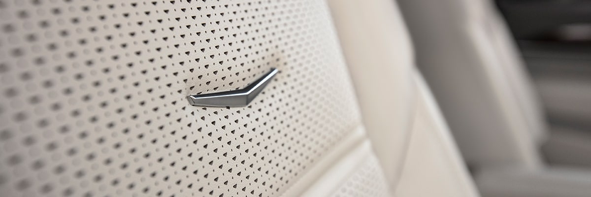 Close-Up of the Cadillac Crest on a 2025 Cadillac Escalade Seat