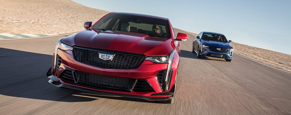 Cadillac V-Series Blackwing Models Racing on Racetrack
