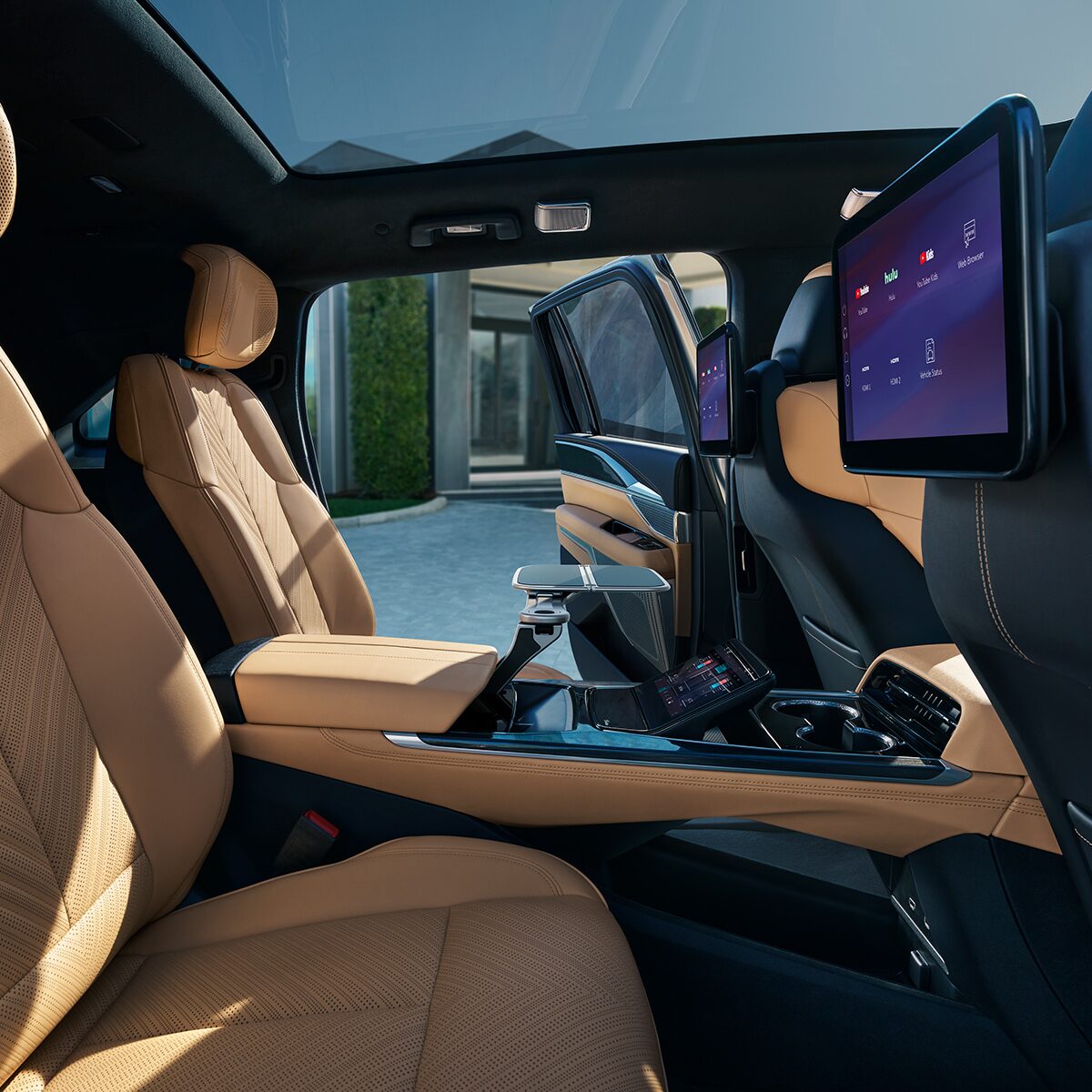Driver's Seat View of a Cadillac's Interior Outlooking a Beautiful Sunset
